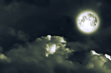 Obraz na płótnie Canvas magic moon over the clouds