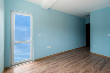 Empty blue room with windows and a door (includes clipping path)