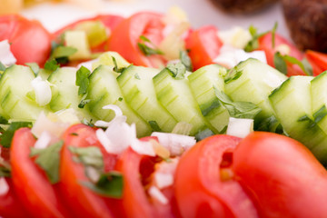 Salad of tomatoes and cucumbers