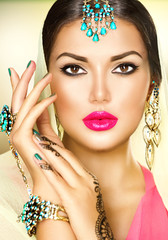 Beautiful fashion Indian woman portrait with oriental jewels