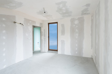 Unfinished building interior, white room (includes clipping path)