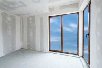Fototapeta premium Unfinished building interior, white room (includes clipping path)