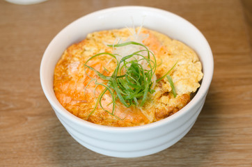 omelet on served steamed rice