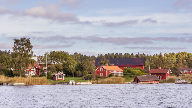 Small rural village with red cottages in south Sweden