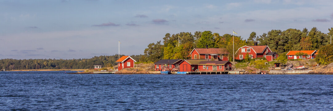 Red cottages on the coast of  south Sweden