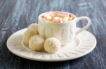 Coconut balls candies and drink