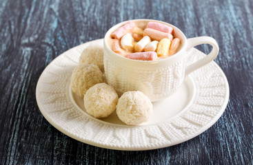Coconut balls candies and drink