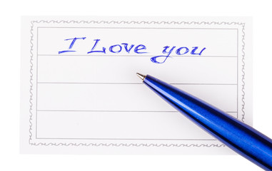 pen and badge with the inscription i love you