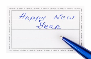 pen and badge with the inscription happy New Year