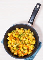stewed potatoes in a frying pan