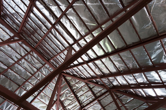 roof with steel beam and silver foil insulation heat on ceiling