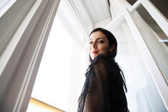At the window