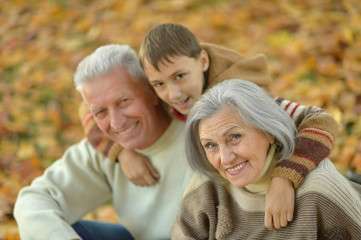 Fototapeta premium Happy family in autumn forest