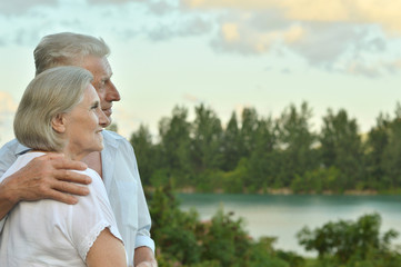 Fototapeta premium Elderly couple near lake