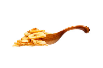 Banana chips in the wooden spoon, isolated on white background.