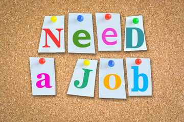 Jobs and career concept with colorful paper pins on billboard