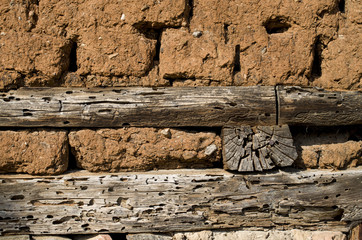 Wall of old adobe house