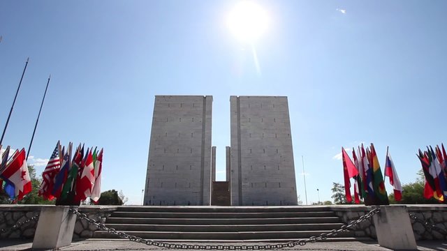 Monument with flags at an international cerimony