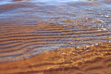 Summer seascape on the sand on the shore