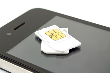 sim card and smart phone on white background
