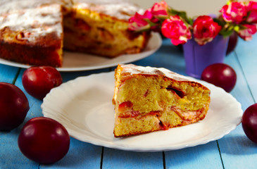 plums pie on a white plate