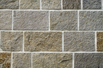 New stone cladding plates on the wall