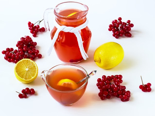 drink with a guelder-rose and a lemon