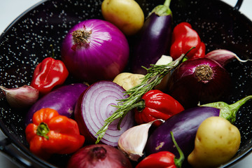 Mix of spicies and vegetables in wok plate close up