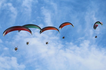 Some pilots  paragliders  make the spectacular perform