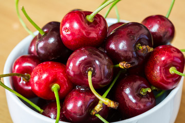 Red Fruit, Handful of a red cherry in a cup