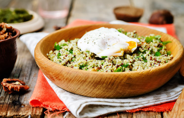 Basil nuts pesto quinoa with walnuts, parsley and poached egg