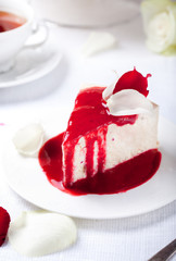 Cheesecake, mousse cake with red berry topping