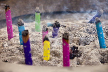 Burning Incense In Urn