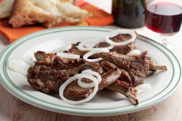 Lamb cutlets and wine