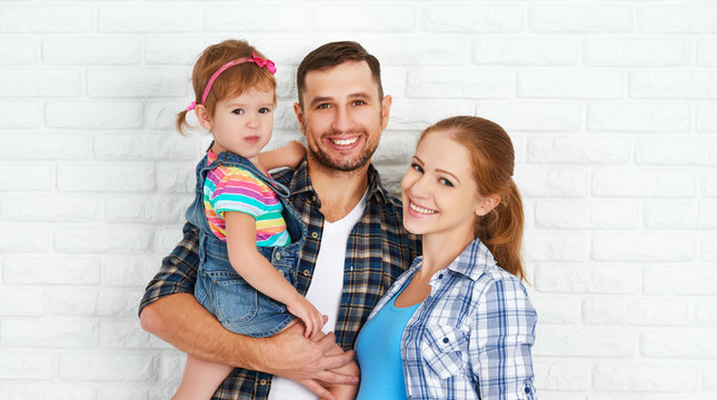 happy family home on brick wall background