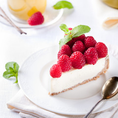 Cheesecake slice with fresh raspberry