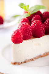 Cheesecake slice with fresh raspberry