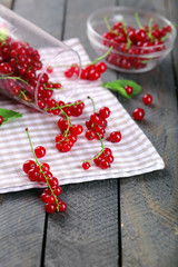 Fresh red currants on table close up