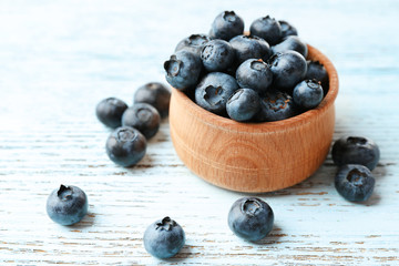 Fresh blueberries in bowl on table close up