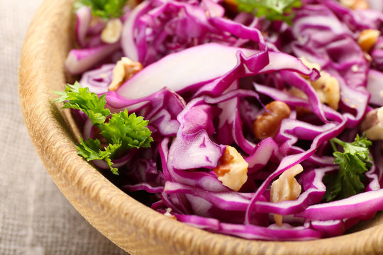 Red cabbage salad in bowl closeup