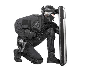 SWAT officer with ballistic shield