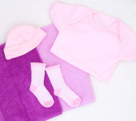 newborn baby girl clothes - studio shot from above