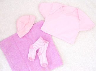 newborn baby girl clothes - studio shot from above