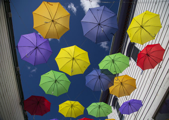 Fototapeta na wymiar Colorful Umbrellas on Main Street