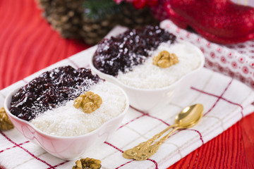 Rice Pudding and Strawberry Jam with Nuts, New Year Decoration in Red Color