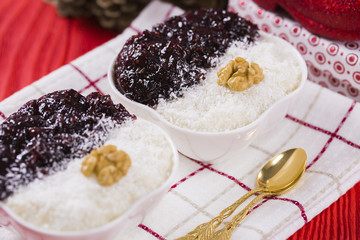 Rice Pudding and Strawberry Jam with Nuts, New Year Decoration in Red Color