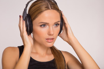 Beautiful woman listening to music