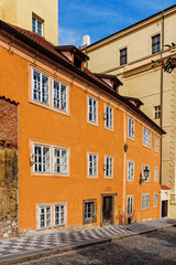 Fototapeta na wymiar Facade of an ancient tenement in Prague, Czech Republic.