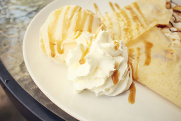 Crepes with banana and ice cream