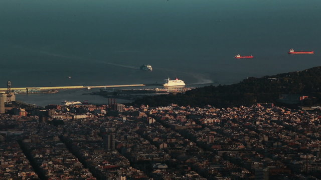 A ferry arrives to the port of Barcelona. Time lapse.